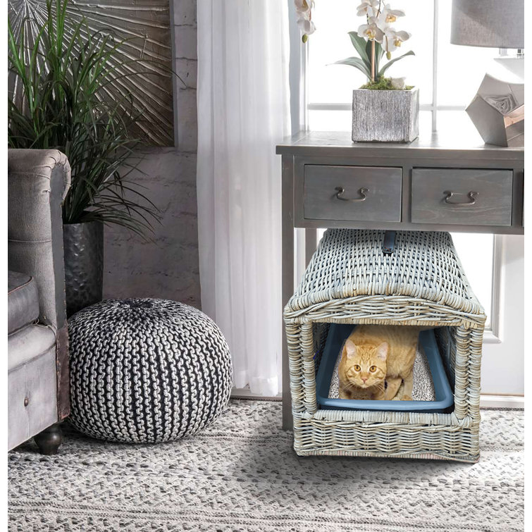 Wicker litter outlet box enclosure